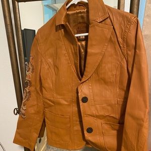Wilson’s Leather light brown jacket. Size small